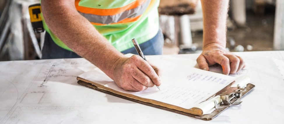 construction site with clipboard